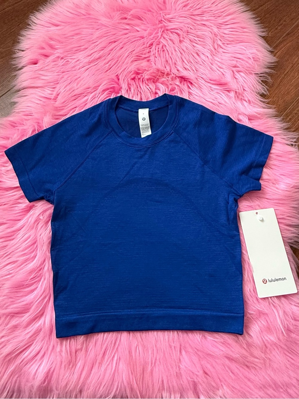 Lululemon size 4 Swiftly Tech Cropped
Short Sleeve 2.0 NWT cerulean blue
